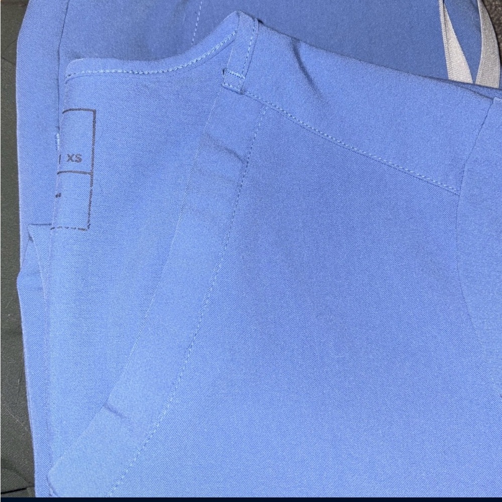 3 sets of Figs uniforms
